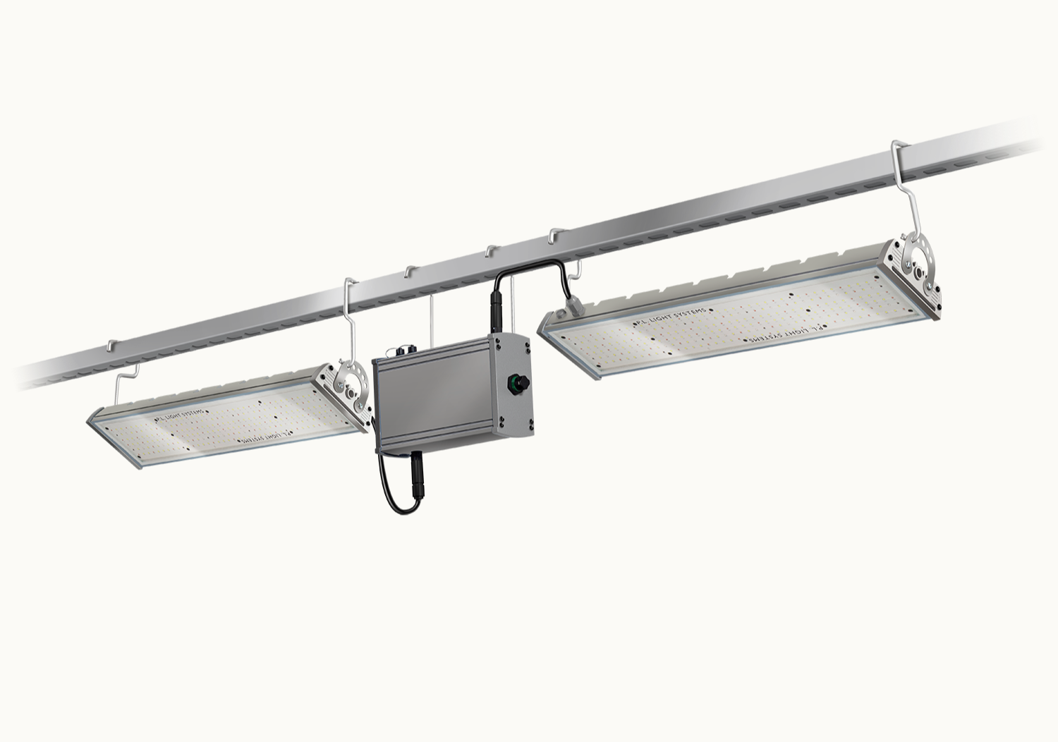 Two TriPlane linear LED fixtures mounted on an overhead track with control box